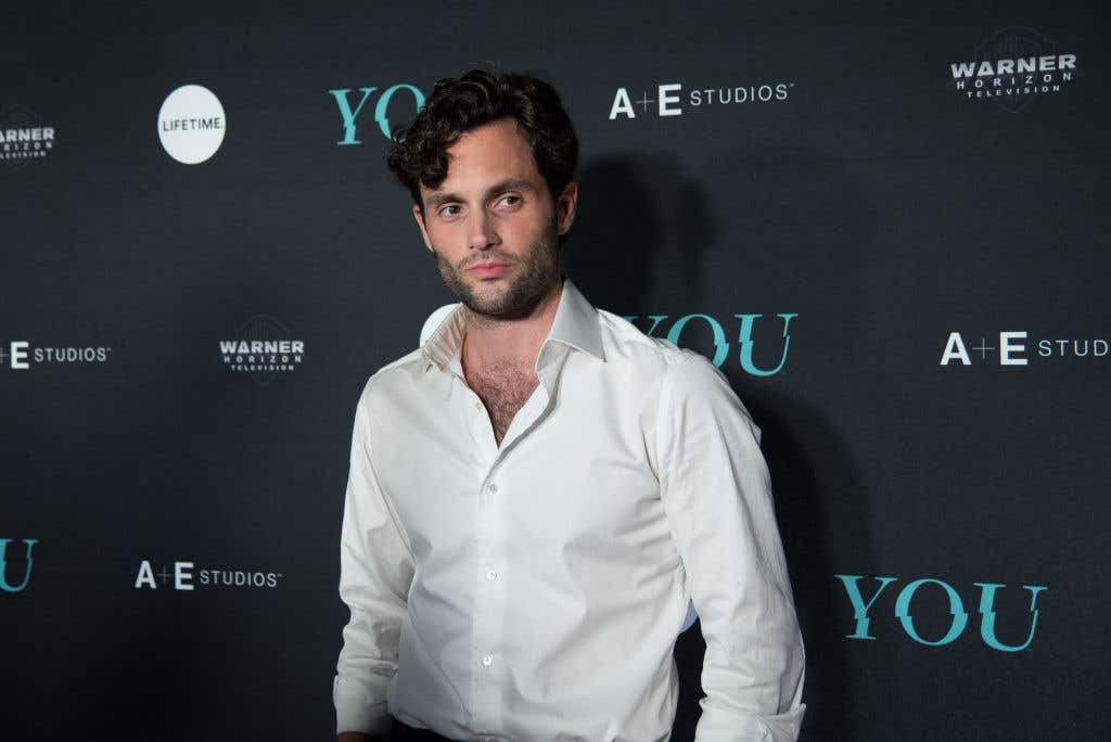 Penn Badgley wearing a white dress shirt during the "You" Series Premiere