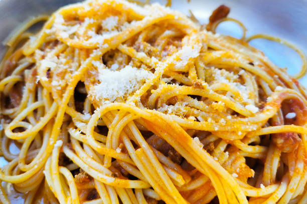 Spaghetti alla bolognese with parmesan cheese is served in Bergamo, Lombardy region of Italy, on September 12, 2022. (Photo by Beata Zawrzel/NurPhoto via Getty Images)